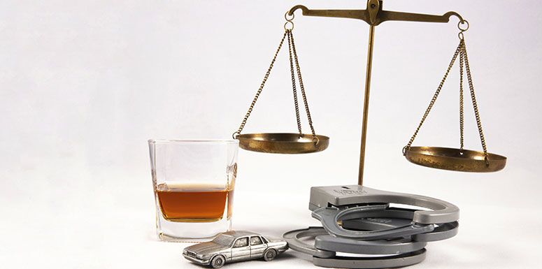 Scale, Drink, Handcuffs, and Car