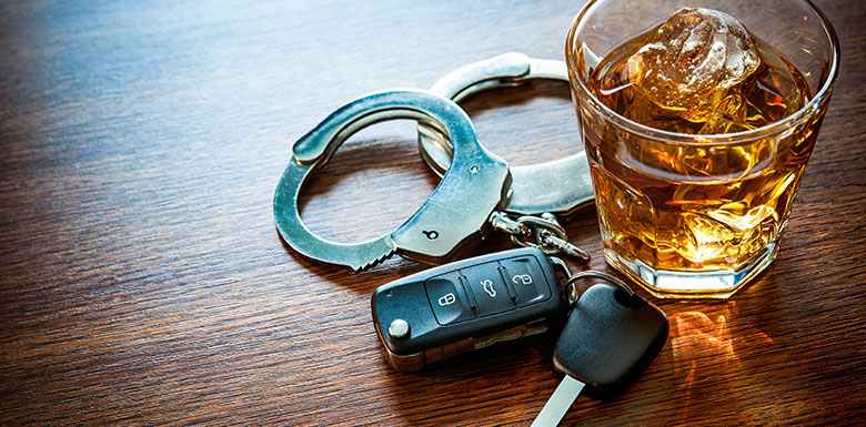 alcohol handcuffs and driving