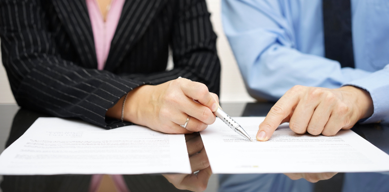 attorney going over documents with client